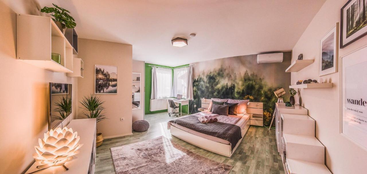 Riverside Apartman**** มิชโคลซ์ ภายนอก รูปภาพ